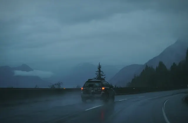 Rainy mountain highway vehicle photo for a BC vehicle appraisal guide