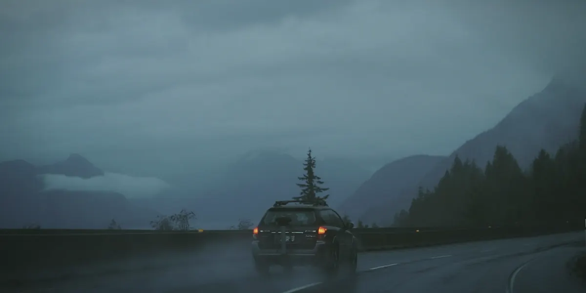 Rainy Sea-to-Sky highway vehicle scene for an independent BC car appraisal